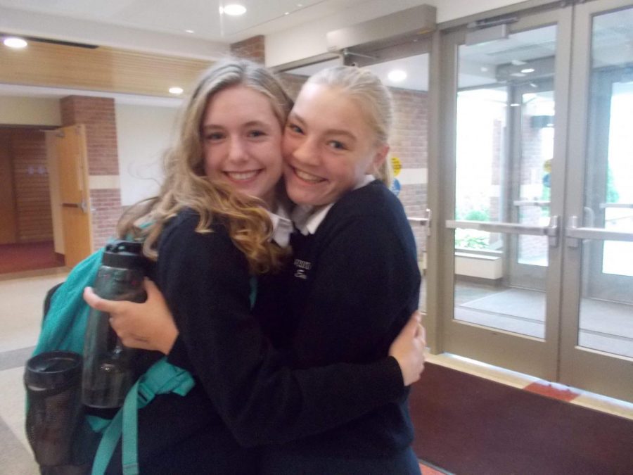 Two sophs hug on first day of school